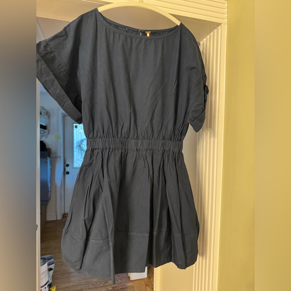 Free People mini dress, open back, NWOT, size small, has pockets!
